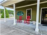 Rocking chairs outside the office at The RV Resort at Carolina Crossroads - thumbnail