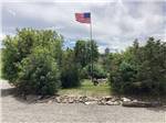 The American flag flying at OLD WEST RV PARK - thumbnail