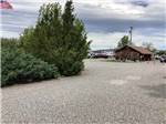 The gravel road leading to the office at OLD WEST RV PARK - thumbnail