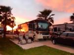 RV parked at a site at sunset at JAMAICA BEACH RV RESORT - thumbnail