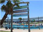 View larger image of Signs in front of the lazy river at JAMAICA BEACH RV RESORT image #5