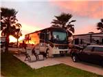 View larger image of RV parked at campsite at JAMAICA BEACH RV RESORT image #7
