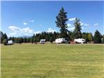 View larger image of Trailers camping next to a grass field at MOUNTAIN VIEW RV PARK image #5