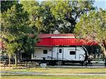 Travel trailer parked at STARS OVER TEXAS RV PARK - FRIO - thumbnail