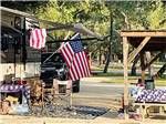 RV site with pergola at STARS OVER TEXAS RV PARK - FRIO - thumbnail