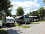 Row of RVs parked at sites at MOUNTAIN GLEN RV PARK & CAMPGROUND - thumbnail