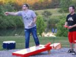 Two men playing corn hole at MOUNTAIN GLEN RV PARK & CAMPGROUND - thumbnail