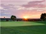 View larger image of Sunset over the golf course at ISLETA LAKES  RV PARK image #7