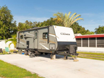 Trailer at site at Ellenton Gardens Sun RV Communities - thumbnail