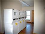 Laundry room with washer and dryers at OASIS RV RESORT - thumbnail