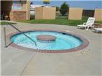 Outdoor hot tub in public pool area at OASIS RV RESORT - thumbnail