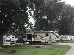 A row of pull thru RV sites at AOK CAMPGROUND & RV PARK - thumbnail