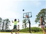 Shooting at a basketball hoop at JELLYSTONE PARK CHINCOTEAGUE ISLAND - thumbnail