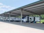 Multiple RVs parked under awning at CAMP MARGARITAVILLE RV RESORT BREAUX BRIDGE - thumbnail