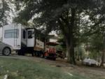 RV parked at site 	Jellystone Park™ Pelahatchie RV Park Campground Resort - thumbnail