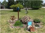 A flower planter with herbs at SKY MOUNTAIN RESORT RV PARK - thumbnail