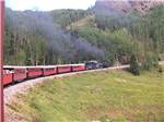 A red train along the mountain nearby at SKY MOUNTAIN RESORT RV PARK - thumbnail