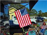 American flag posted outside RV at COYOTE VIEW RV PARK & RV REPAIR - thumbnail