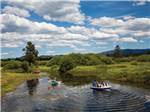 Kids boating at THOUSAND TRAILS BEND-SUNRIVER - thumbnail
