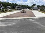 View larger image of A couple of the paved pull thru RV sites at COASTAL GEORGIA RV RESORT image #5