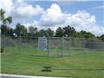 View larger image of The fenced in dog run at COASTAL GEORGIA RV RESORT image #11