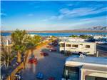 A row of RV sites with picnic benches at CAMPBELL COVE RV RESORT - thumbnail