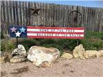 A home of the free sign at EAST VIEW RV RANCH - thumbnail