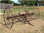 An old piece of farming equipment at EAST VIEW RV RANCH - thumbnail