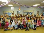 A group of kids dressed up - thumbnail
