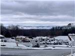 The campground sites covered with snow at MAYBERRY CAMPGROUND - thumbnail
