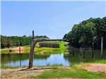 Fishing pond at Cross Winds Family Campground - thumbnail