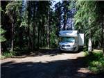 View larger image of Class C in site surrounded by tall trees at TANANA VALLEY CAMPGROUND image #5