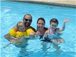 A family enjoying the swimming pool at YOGI BEAR'S JELLYSTONE PARK AT DELAWARE BEACH - thumbnail