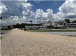 View larger image of A row of gravel RV sites at MONTGOMERY SOUTH RV PARK  CABINS image #3