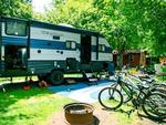 RV in a site with bikes in a row - thumbnail