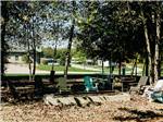 Chairs around a fire pit at Timbercrest Camp and RV Park - thumbnail