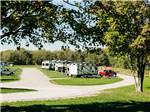 RVs in sites at Timbercrest Camp and RV Park - thumbnail