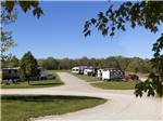 RVs lined up in sites at Timbercrest Camp and RV Park - thumbnail