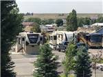Rows of RVs camping in spaces at COYOTE RUN RV PARK - thumbnail