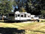 Parked RV with panic area at site Indian Heritage RV Park - thumbnail