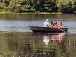 Family in a row boat at PINEWOOD LODGE CAMPGROUND - thumbnail