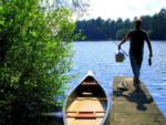 Fishing on a boat dock at PINEWOOD LODGE CAMPGROUND - thumbnail