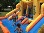 Kids playing in the water slide at WHITE PINES CAMPSITES - thumbnail