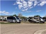A group of occupied RV sites at GREAT FALLS RV PARK - thumbnail