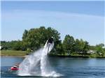 View larger image of A man with a water jet at LAKEVIEW RV PARK image #1