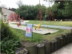 View larger image of A view of the playground equipment at SEA GROVE CAMPING RESORT image #2