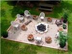 View larger image of A aerial view of the fire pit and seating at BONNIE BRAE CABINS  CAMPSITES image #8