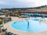 Pool with play area at Yogi Bears Jellystone Park at Larkspur - thumbnail