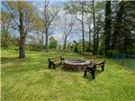 Fire pit with benches at SUN OUTDOORS CAPE MAY - thumbnail