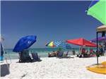 Colorful beach umbrellas  at CAMPING ON THE GULF - thumbnail